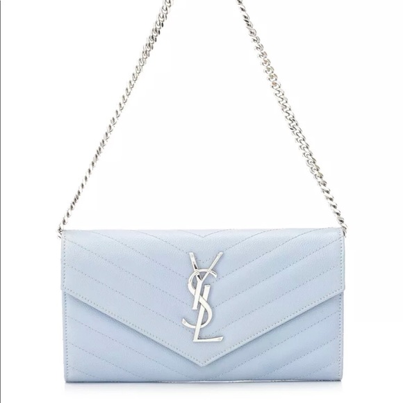 — YSL's envelope chain wallet gives casual